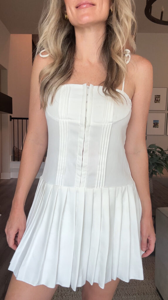 white pleated mini dress